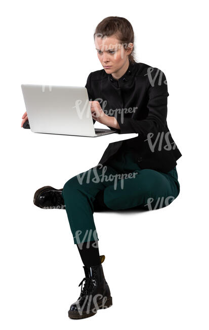 woman sitting at the table and working with computer