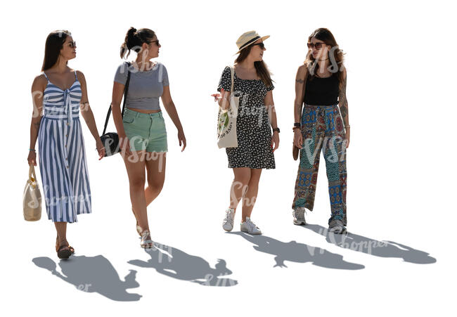 four backlit women walking