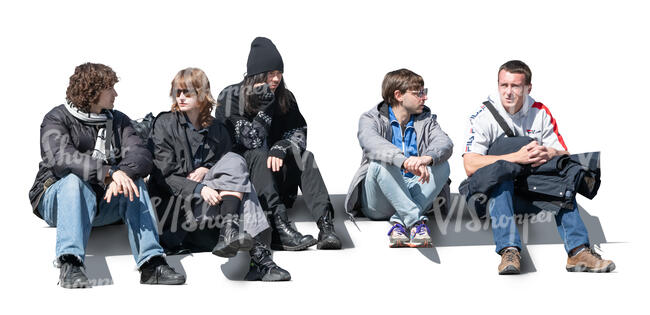 group of young people sitting on the stairs outside