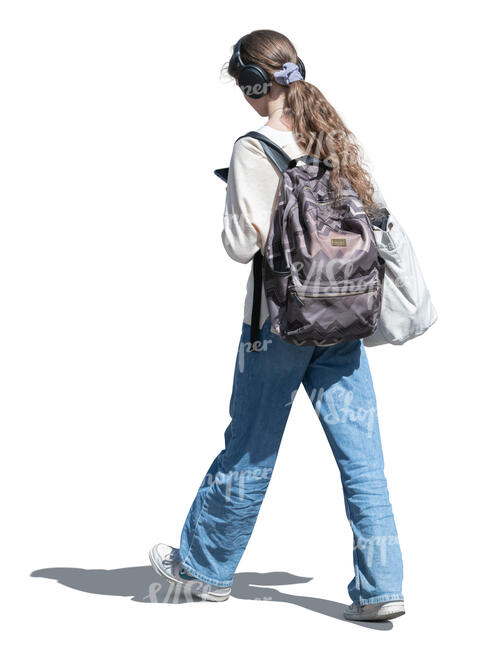 cut out teenage girl walking and listening to music