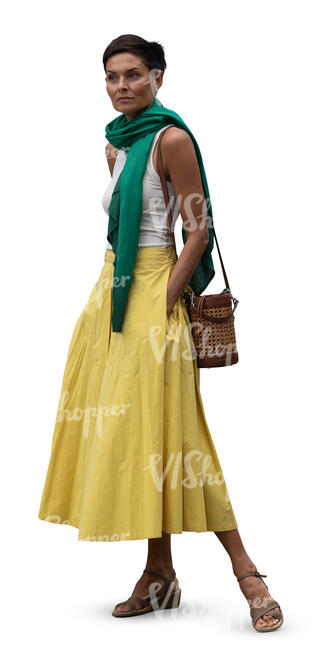 short haired woman in a colorful outfit standing