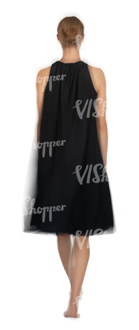 motion blur woman in a black dress walking