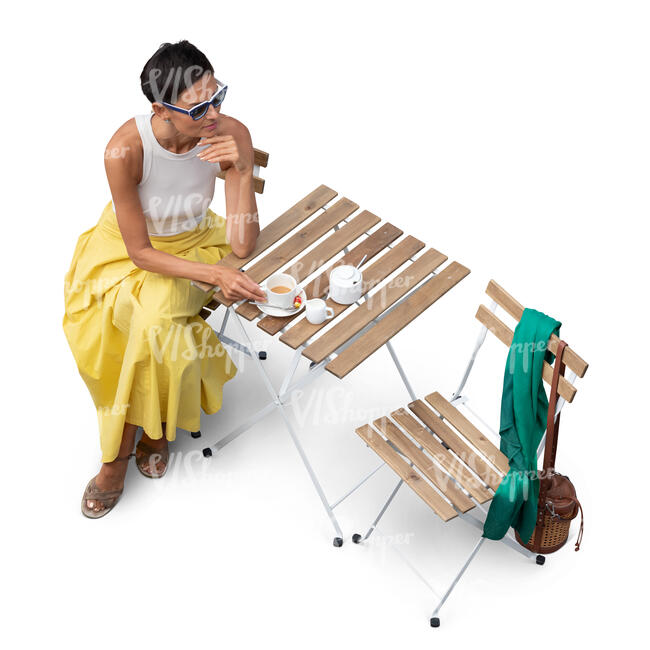woman sitting in a cafe seen from above