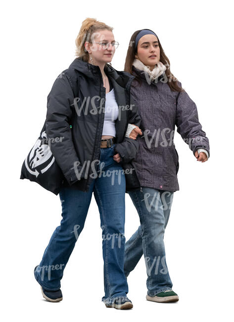 two women in autumn walking together