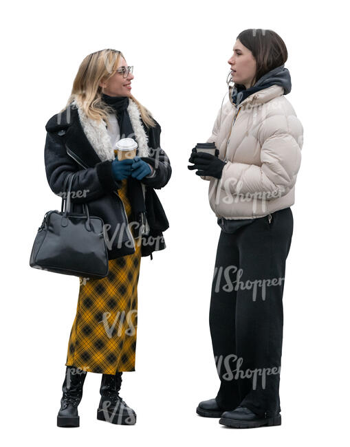 two women standing outside in late autumn and drinking coffee
