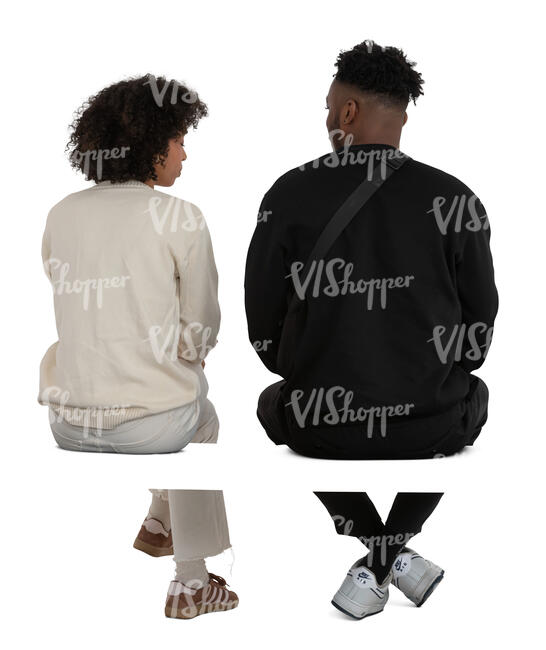 two people sitting seen from behind
