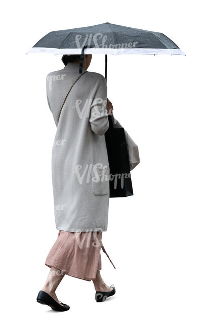 cut out woman with an umbrella walking
