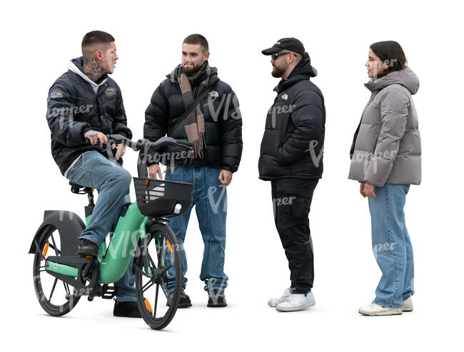 group of people standing in the street and talking