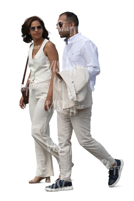 two cut out people in formal summer clothes walking