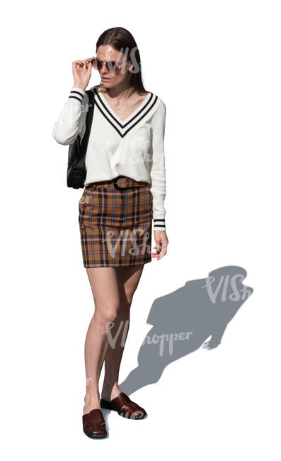 top view of a young woman with sunglasses standing