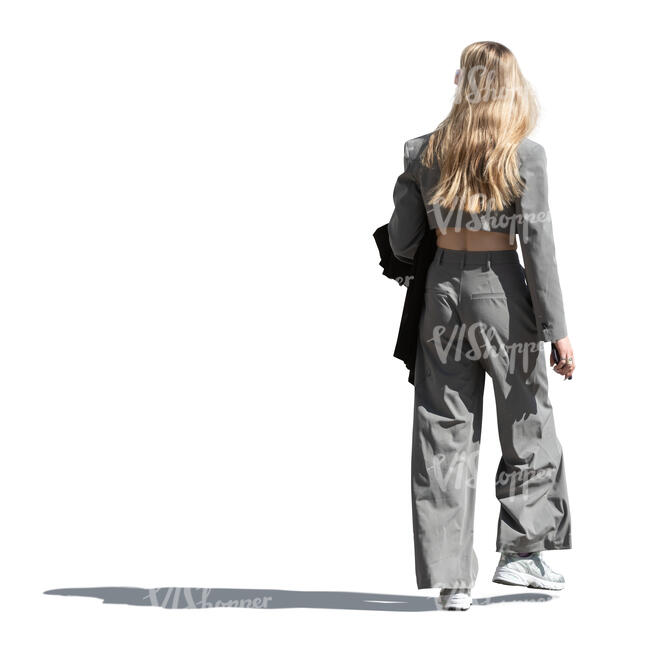 young woman in a casual street style walking