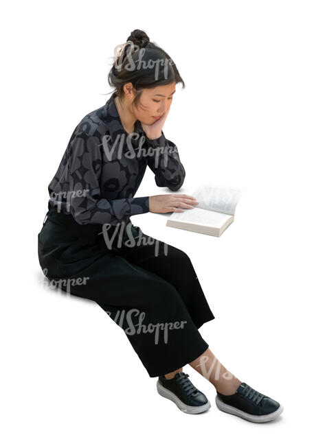 cut out asian woman sitting and reading seen from above
