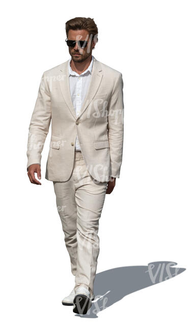cut out man in a white suit walking
