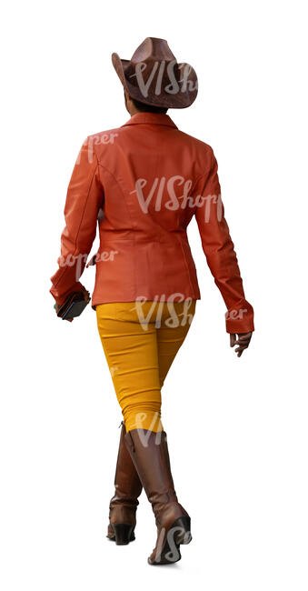 woman with a cowboy hat and boots walking