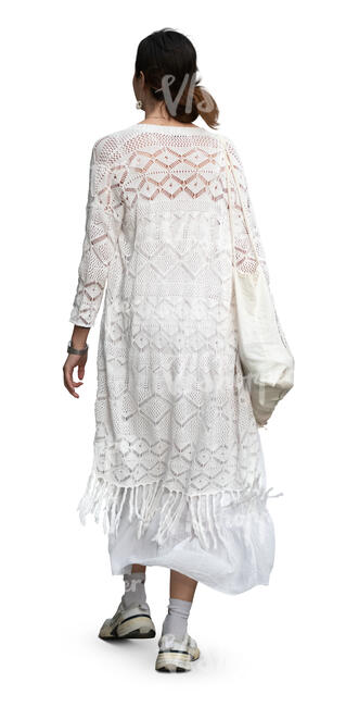 cut out woman in a white outfit walking