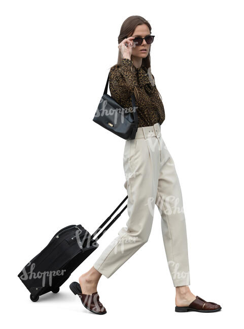 cut out woman with a suitcase walking