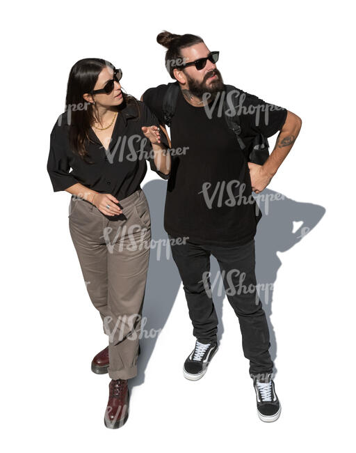 top view of two people standing and looking up