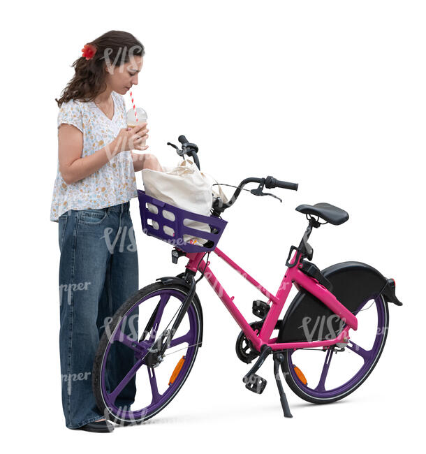 woman with a bike taking smth from the bike basket