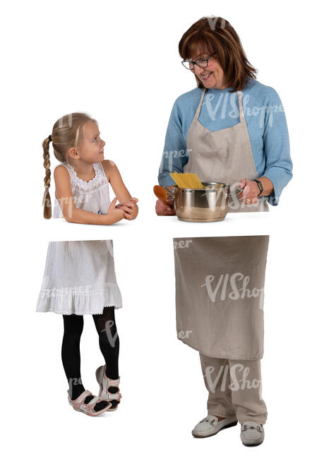 grandmother and granddaughter cooking in the kitchen