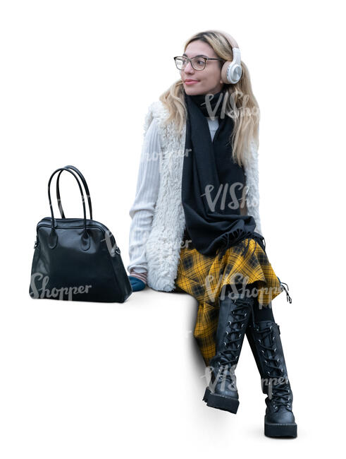 cut out woman with headphones sitting