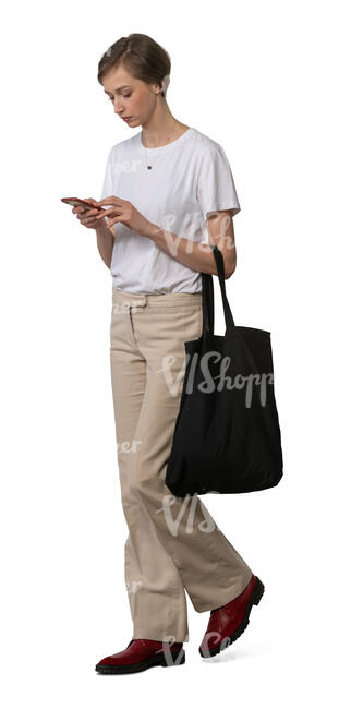 cut out woman with a phone walking