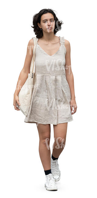 cut out woman in a mini summer dress walking