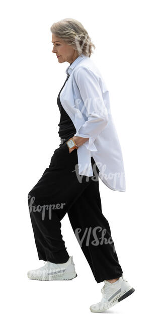 senior woman walking up the stairs