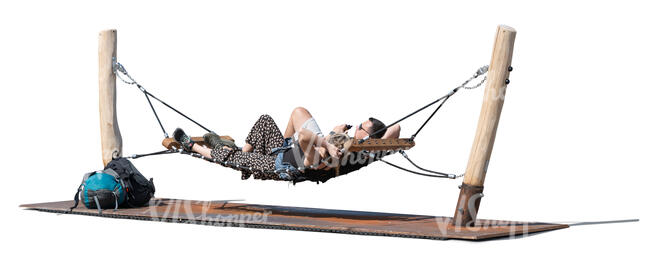two people lying in an outdoor hammock