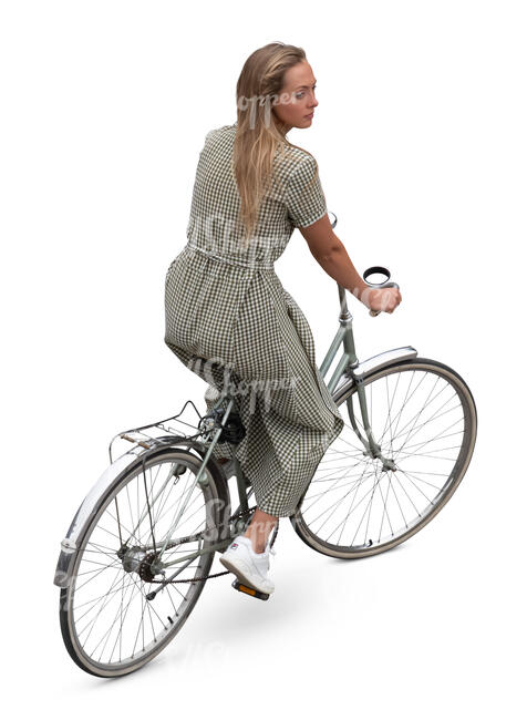 top view of a woman in a long dress riding a bike
