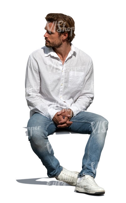 cut out man in a white shirt and jeans sitting