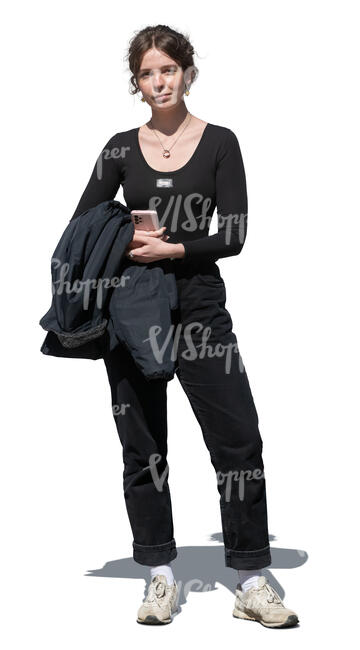 young woman in casual black outfit standing