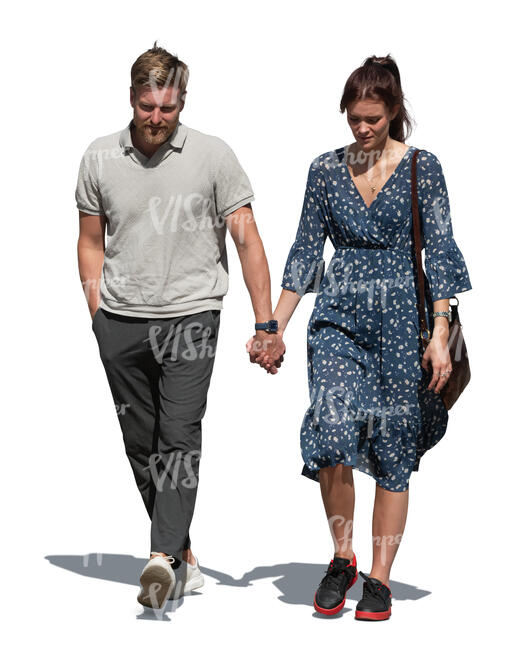 man and woman walking hand in hand