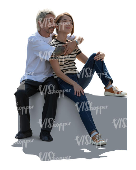 cut out backlit asian couple sitting