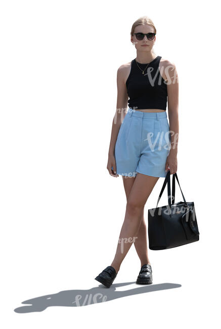 cut out woman standing casually in backlight