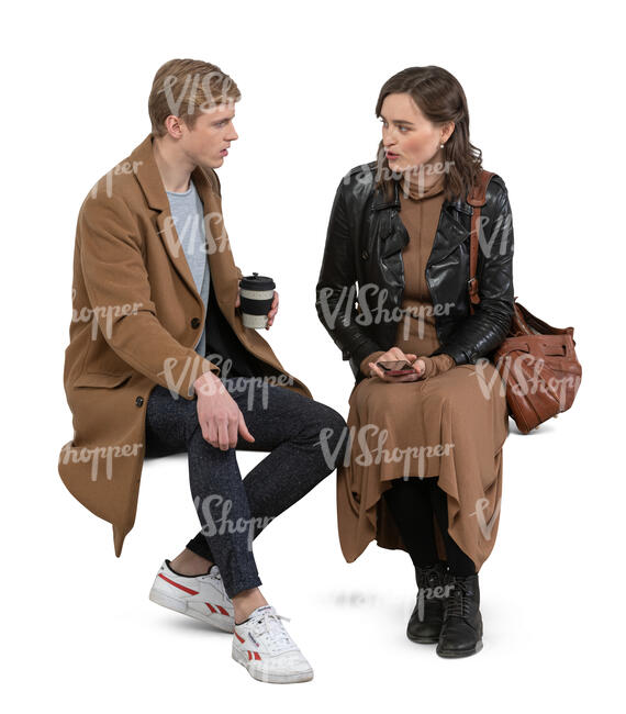 two cut out people sitting and talking and drinking coffee