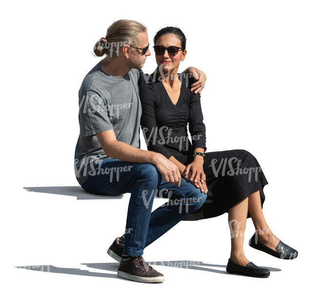 man and woman sitting together