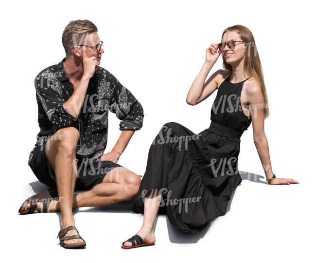 man and woman sitting outside in summer and talking