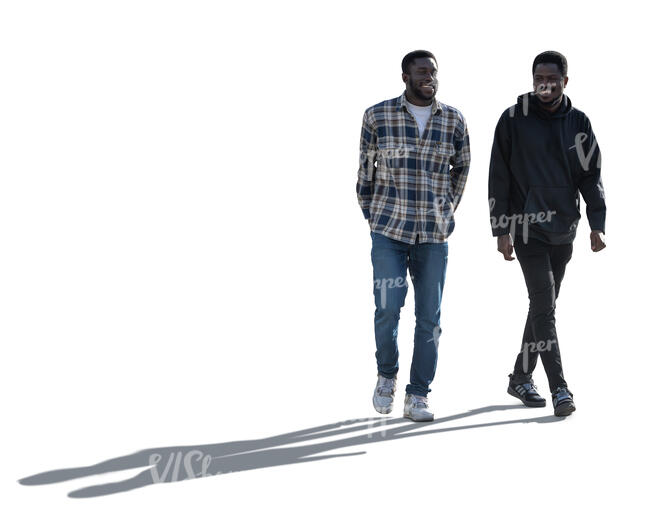 two cut out backlit black men walking
