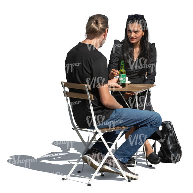 cut out man and woman sitting in an outdoor cafeteria