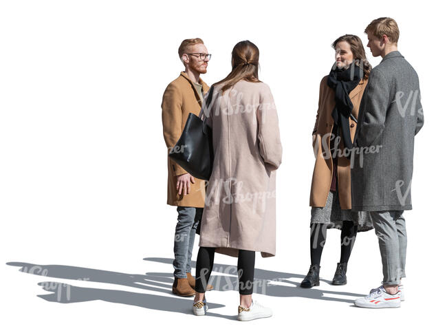 group of people standing outside on a sunny autumn day