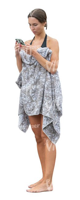 cut out woman standing with a towel after swimming