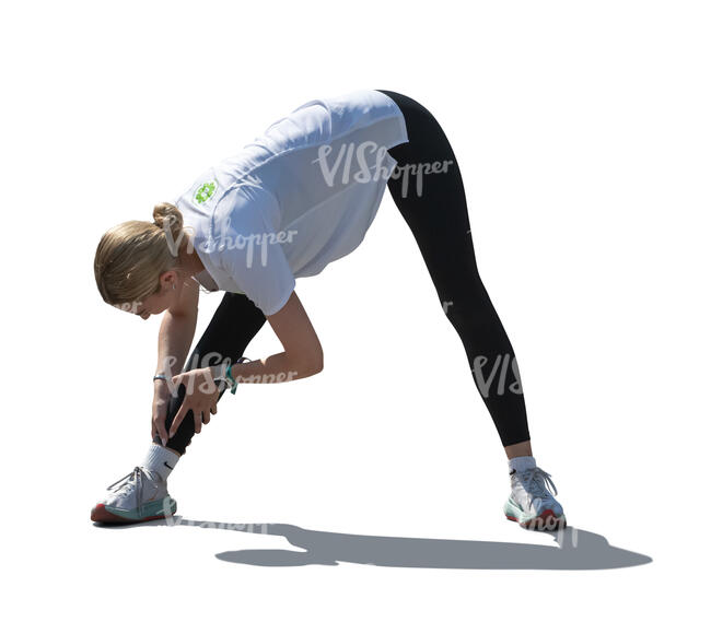 cut out backlit woman doing stretching exercises outside