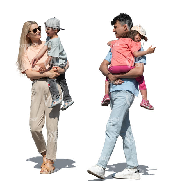 man and woman walking and holding kids in their arms