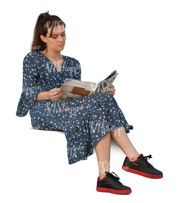 cut out woman sitting on a sofa and reading a magazine