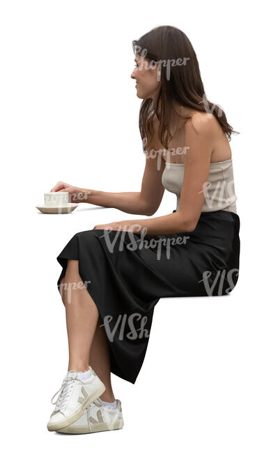 woman sitting and drinking coffee