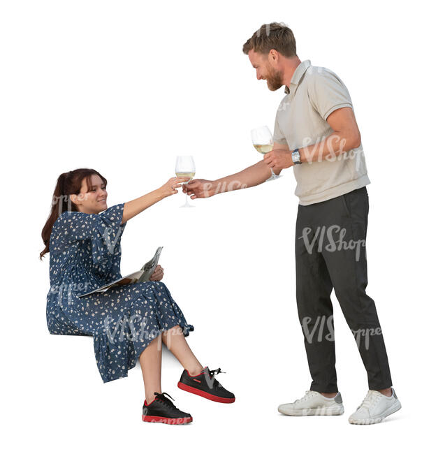 man bringing wine to a woman sitting on a sofa