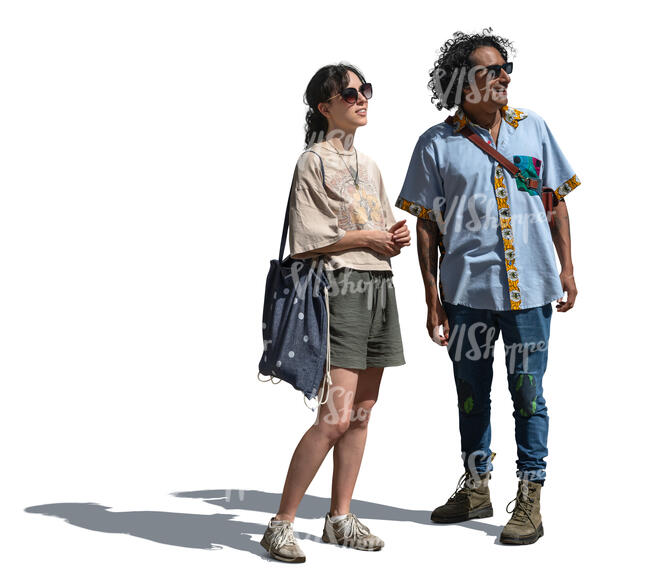 latino man and a woman standing and looking up