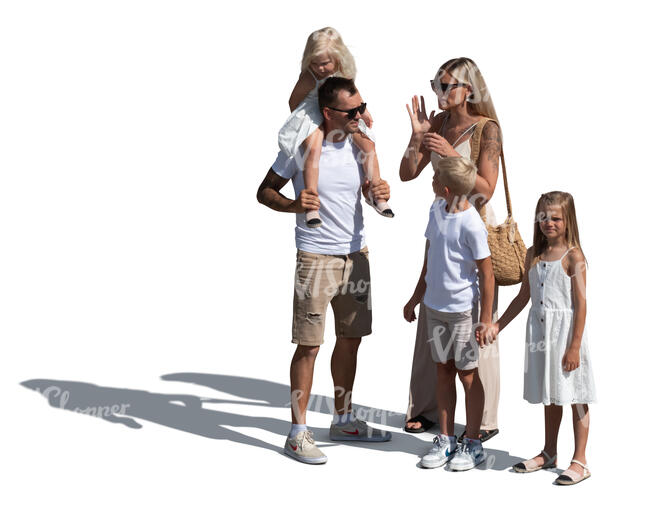 family with three children standing in the street in summer