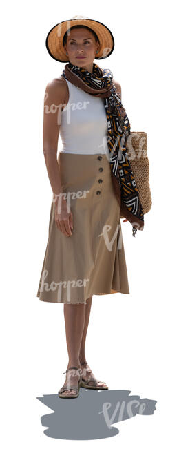 cut out backlit woman with a hat standing