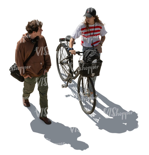 top view of two people walking in backlight